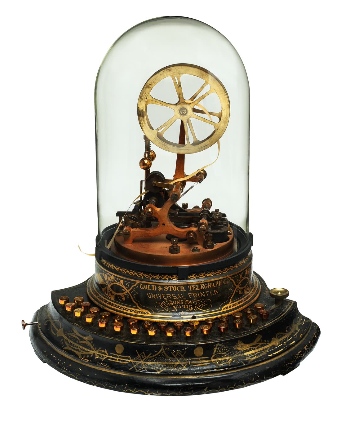 An early brass stock ticker under a glass dome